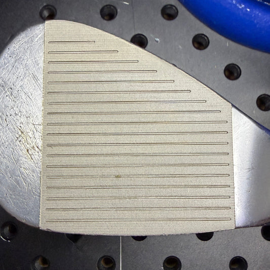 Golf Club Face - Laser Engraved Micro Grooves close-up showing detailed surface for enhanced grip and control